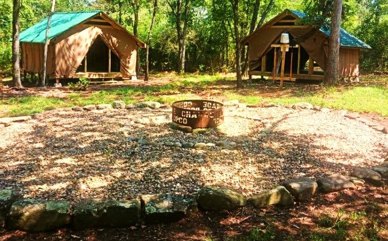 front of small house at burnham woods girl scout property